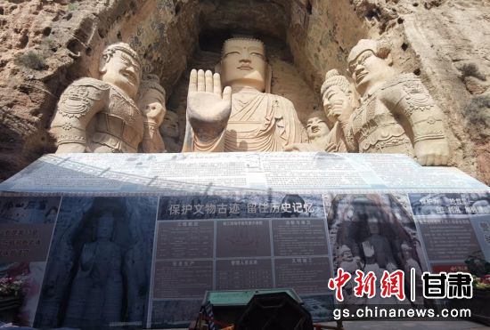 時下，中國“石窟鼻祖”天梯山石窟第13窟大佛足部與局部危巖體搶救性保護項目正在施工。圖為施工現(xiàn)場。陳曉斌 攝